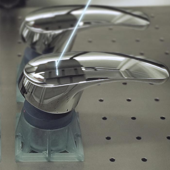 Faucet receives laser engraving